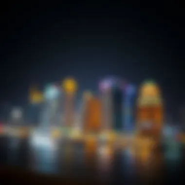 Nighttime skyline of Deira Island illuminated with city lights.