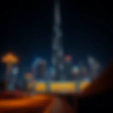 Night view of Al Yousifi Tower illuminated against the Dubai skyline