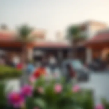 Vibrant community space in Warsan Village filled with residents enjoying leisure activities