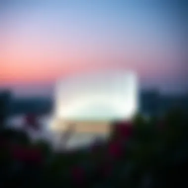 A scenic twilight view of the Dubai Fountain showcasing its light show