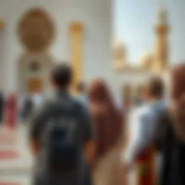 Visitors dressed appropriately for a local religious site in Dubai