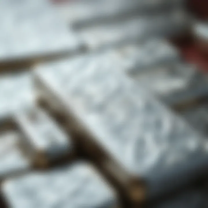 A close-up of a silver bar with intricate designs